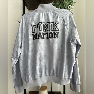 Women’s Victoria’s Secret pink nation zip jacket, size large.